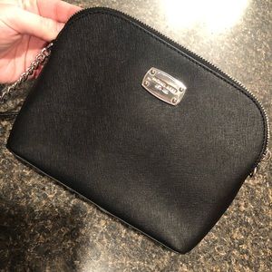 Michael Kors, small woman’s cross body bag